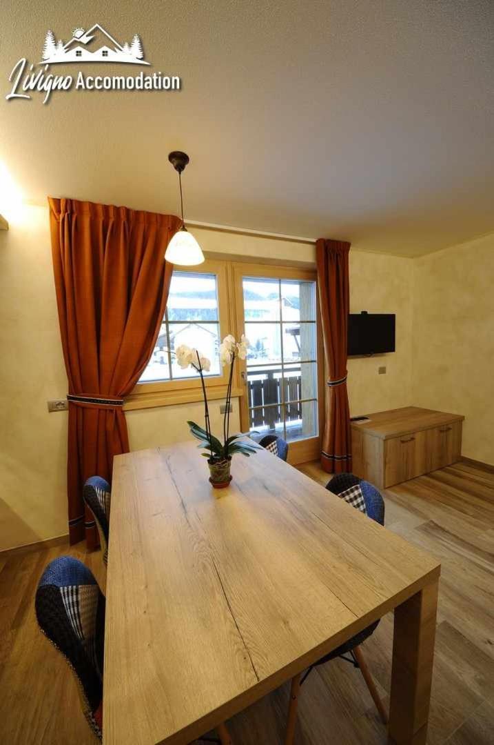 Alpen Flower By Livigno Accomodation Quarto foto