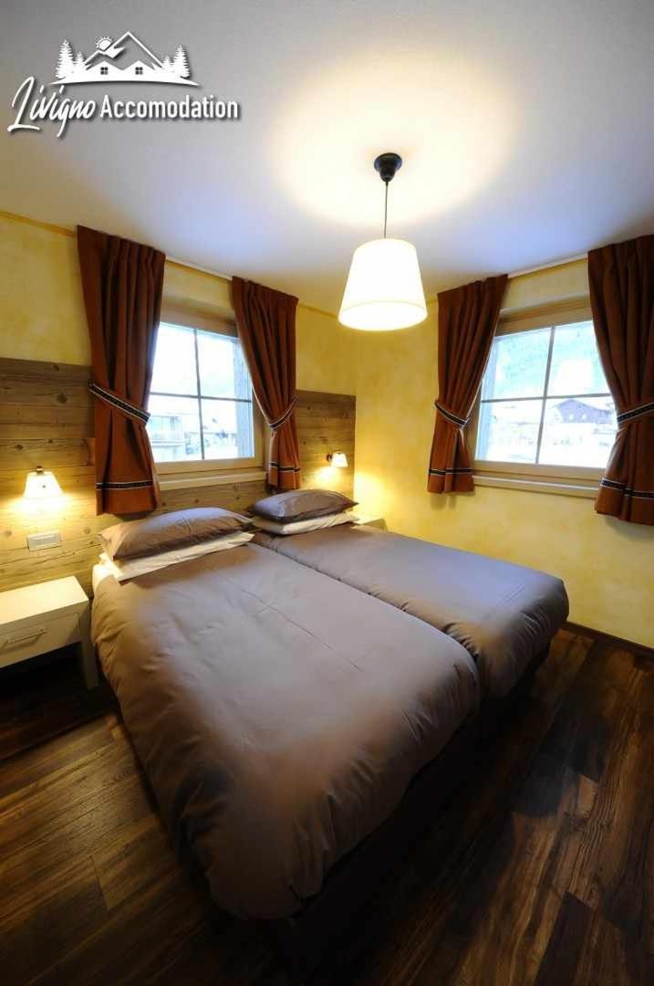 Alpen Flower By Livigno Accomodation Quarto foto